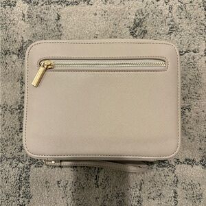 Chic Beige Cosmetic Bag with Gold Accents